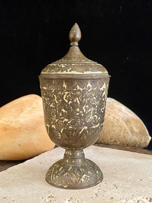 Russian Orthodox church communion chalice. Early 20th century. Engine turned brass with elaborate inlay enamel decoration in white with blue and red highlights. The enamel work is very worn and rubbed in places. Height 15 cm, width 6.5 cm.