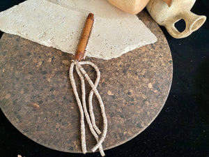 This is a vintage wood sewing needle case from northern Thailand, from the Ahka tribe. This beautiful, old and rare vintage piece is highly decorated and made from bamboo, etched, stained with red betel juice and finished with a long fringe of Jacob's tears. Length 24.5 cm with fringe, length of tube 9 cm