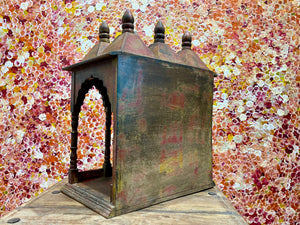 Solid timber shrine, nicho or display box, with three sections or bays,  beautifully carved and finished on three sides and inside with carved pillars, solid wood back, stepped up footing and peaked roof with finial. Most likely teak. Dates from the 1950-60s, southern India. Height 47.5 cm, depth 25 cm, width 38 cm