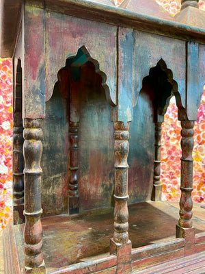 Solid timber shrine, nicho or display box, with three sections or bays,  beautifully carved and finished on three sides and inside with carved pillars, solid wood back, stepped up footing and peaked roof with finial. Most likely teak. Dates from the 1950-60s, southern India. Height 47.5 cm, depth 25 cm, width 38 cm