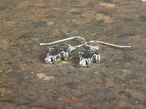 Stylish and very small hamsa earrings. The body of the earring is made from a non-tarnishing white metal indistinguishable from silver, while the pins and hooks are sterling silver. Lightweight and very easy to wear. Measurements: drop including hook 2 cm