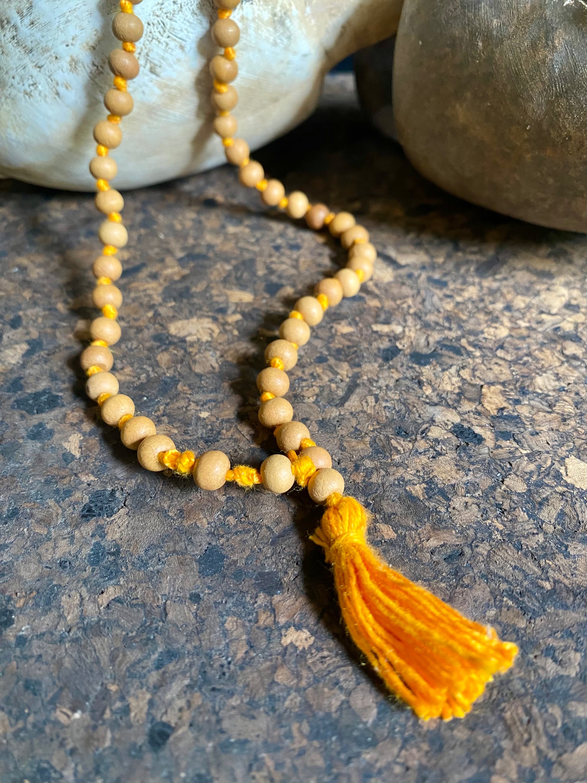 Women or men’s fine sandalwood mala necklace. Made from natural sandalwood. Knotted between each bead. As per a standard Buddhist mala, it contains 108 beads. Each bead 5 mm diameter