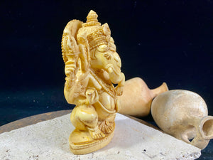 This is an exquisite Ganesh statue cast in cream coloured resin. Our very detailed Ganesh is hand finished to a very high standard. Measurements: height 16 cm, width 10 cm, depth 6 cm