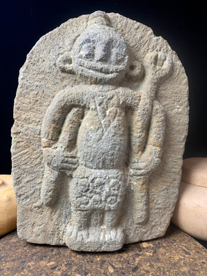 Antique Indian village carving, most likely tribal Bhastar or Kondi. This stele relief carving depicts a very rudimentary image of Shiva, identified by his trident. A village artefact collected from Orissa province, this type of statue would guard the road into and out of the village, enclosed in a small shrine. Height 29.5 cm x width 23 cm x depth 7 cm