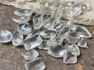Natural rock crystals facet cut into gems of the highest quality and clarity. Approximately 1.5 - 2.5 cm length
