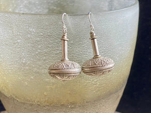 Get the look without the weight.  These earrings are big and impressive, but they are also lightweight and easy to wear. Why? Because our earrings are crafted from handmade vintage Indian hollow-construction sterling silver beads.  These beads date to the mid 20th century and were collected by Bernard Heaphy, the founder of kashgar, from northwest India.  Measurements: length 4 cm