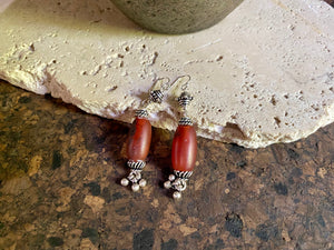 Beautiful long drop earrings combine antique carnelian stones with handmade Indian silver beads and sterling silver hooks. Carnelian stones from Nepal, 5.8 cm length