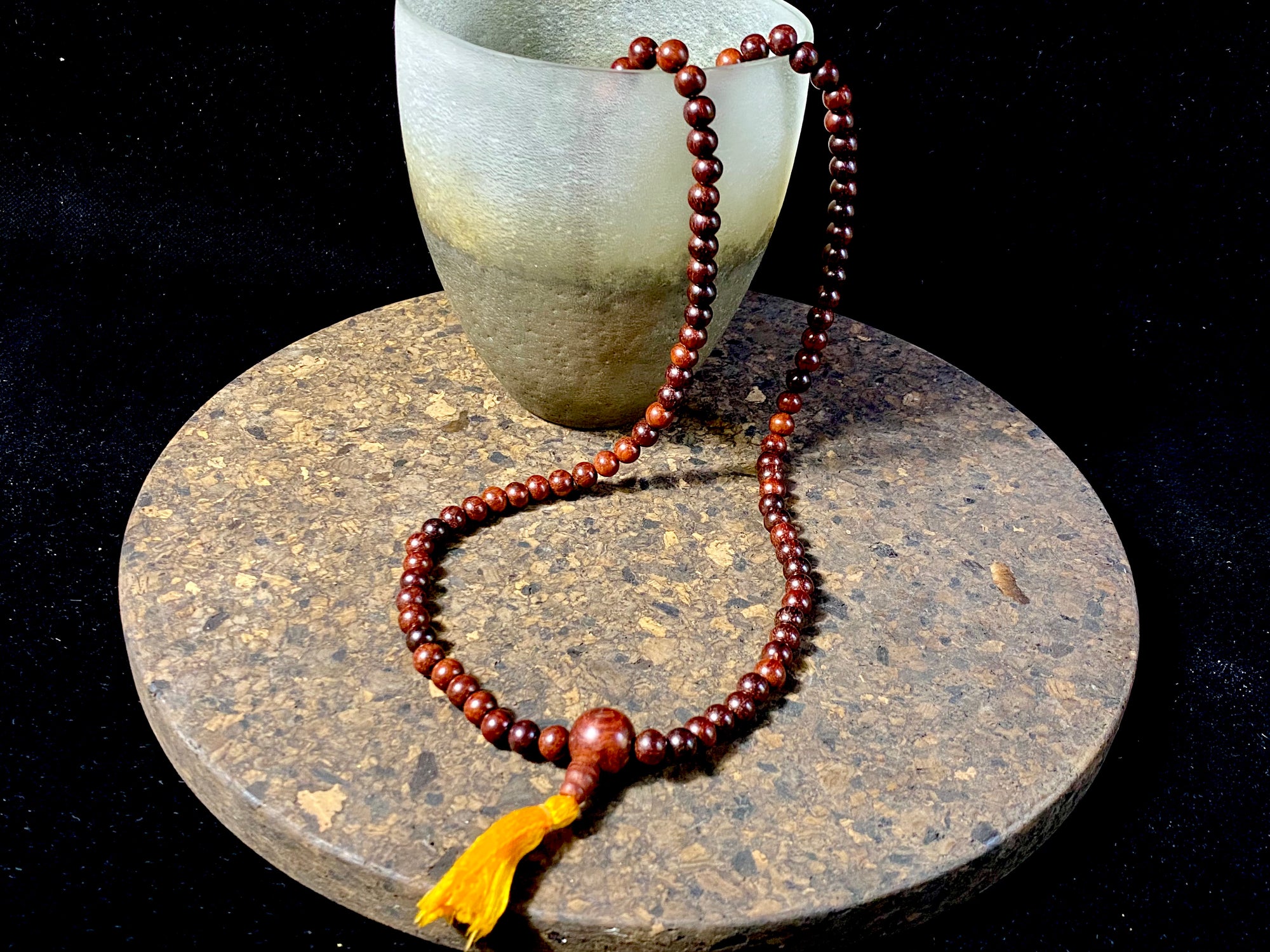 Women or men’s mala necklace, made from natural, dark sandalwood. This beautiful mala is exceptionally well made and has a pleasing lustre, weight and feel in the hand. As per a standard Buddhist mala, it contains 108 beads. From India