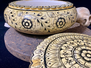 A beautiful low oval lidded bowl or box, traditionally called an opium pot because of its shape. Crafted from hand shaped panels of camel bone over wood, then hand painted. Hand made in Rajasthan, India. Measurements: diameter 24.5 cm, height 10 cm.