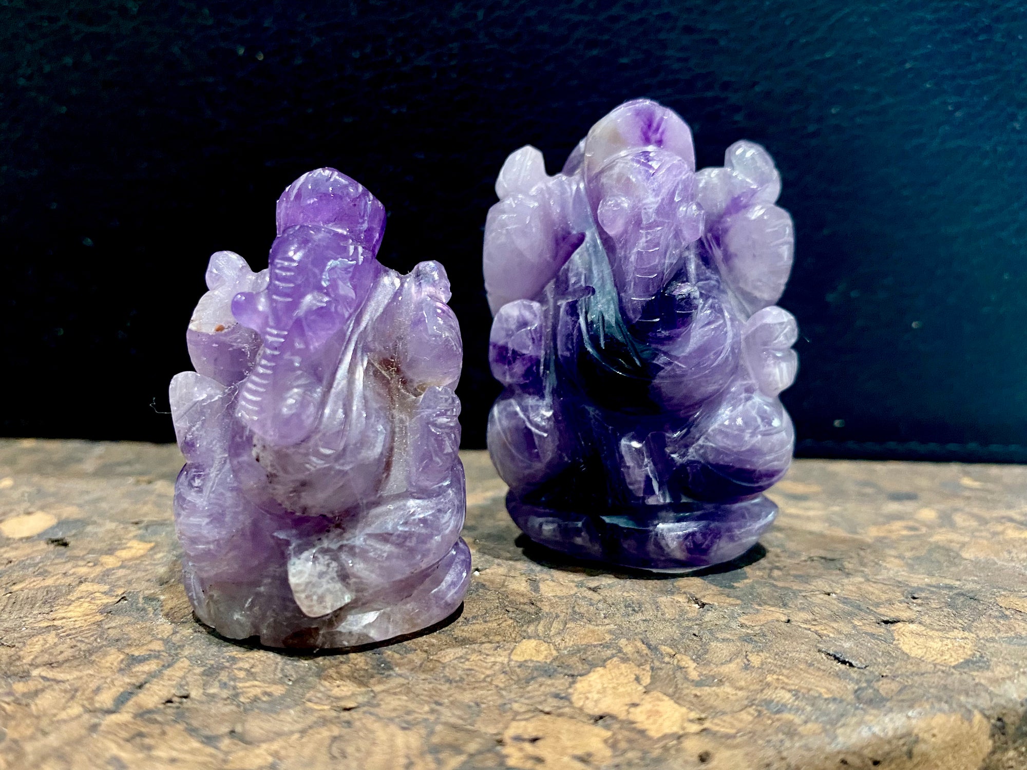 Hand carved from high quality, solid chunks of amethyst crystal, measurements: Large - 4.3 cm height, width at base 3 cm, Small - 3.7 cm height, width at base 2.6 cm