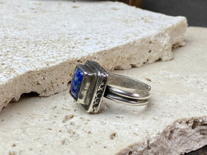 This beautiful vintage ring features a lapis lazuli stone. This ring sits high on the finger and is a definite statement piece. High grade silver. From Afghanistan, mid 20th century. Adjustable. Measurements: Ring face 1.6 x 1.3 cm, diameter 18.5 mm | Size 8.5 | No 19, to fit any finger from 7 - 9