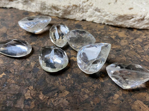 Natural rock crystals facet cut into gems of the highest quality and clarity. Approximately 1.5 - 2.5 cm length