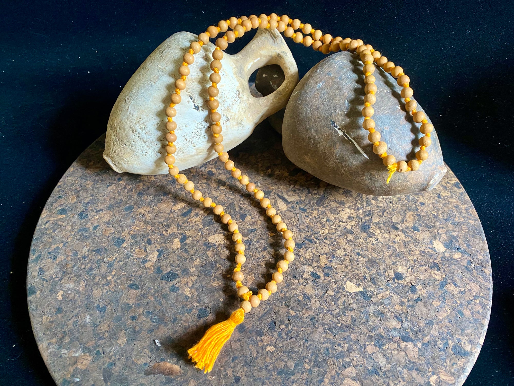 Women or men’s fine sandalwood mala necklace. Made from natural sandalwood. Knotted between each bead. As per a standard Buddhist mala, it contains 108 beads. Each bead 5 mm diameter