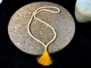 Women or men’s mala necklace, made from natural tulsi wood. As per a standard Buddhist mala, it contains 108 beads. From India