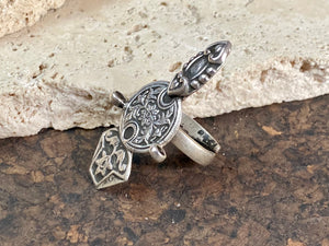 Stunning tribal ring from regional Rajasthan, India. High grade or sterling silver. Adjustable back so it will fit a number of different finger sizes. Measurements: Ring face: 4.5 x 2.6 cm Size: Anywhere from size 6 to size 8, this ring is adjustable