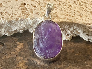 Hand carved amethyst ganesh pendant in a sterling silver mount. Height 3.3 cm