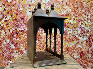 Solid timber shrine, nicho or display box, with three sections or bays,  beautifully carved and finished on three sides and inside with carved pillars, solid wood back, stepped up footing and peaked roof with finial. Most likely teak. Dates from the 1950-60s, southern India. Height 47.5 cm, depth 25 cm, width 38 cm