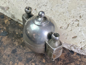 This Shiva lingam box or container is is a fine example of casket workmanship. Dating from the early 20th century or earlier, it is hand cast from high-grade silver & features wear marks commensurate with a piece this age. Measurements: Height 4.8 cm (1.85"), width 5 cm (2")