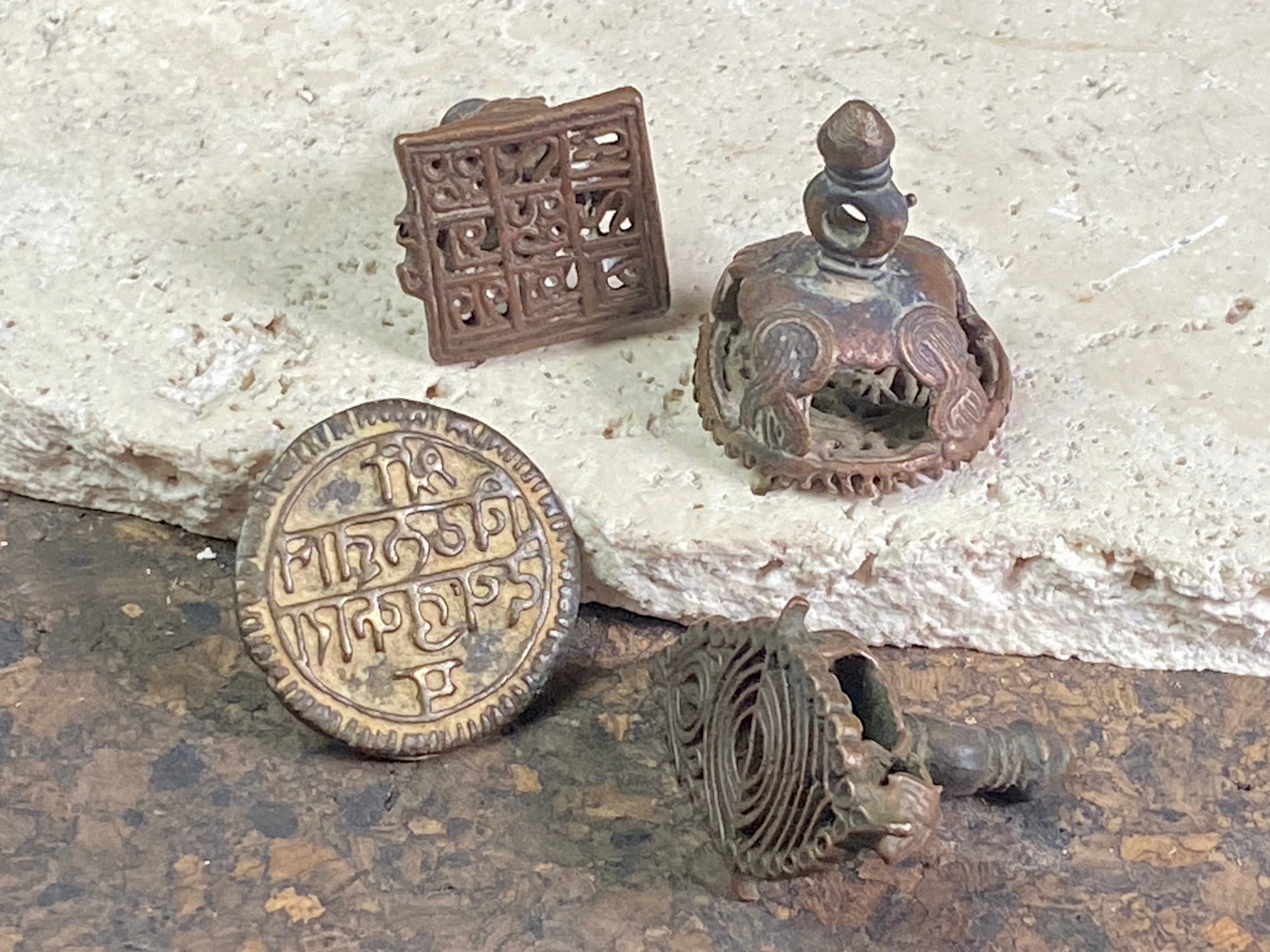 Made from a copper bronze alloy, these east Indian temple stamps are made via the lost wax method of casting and are called Chhapa stamps. They originate in Orissa and Bengali temples, India - ca. 1900.