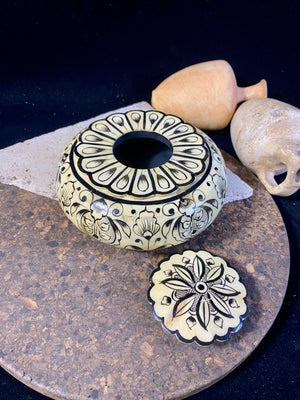 A beautiful low oval lidded bowl or box, traditionally called an opium pot because of its shape. Crafted from hand shaped panels of camel bone over wood, then hand painted. Hand made in Rajasthan, India. Measurements: diameter 15.5 cm, height 6.5 cm. 