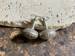Get the look without the weight.  These earrings are big and impressive, but they are also lightweight and easy to wear. Why? Because our earrings are crafted from handmade vintage Indian hollow-construction sterling silver beads.  These beads date to the mid 20th century and were collected by Bernard Heaphy, the founder of kashgar, from northwest India.  Measurements: length 4 cm