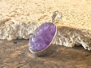 Hand carved amethyst ganesh pendant in a sterling silver mount. Height 3.3 cm