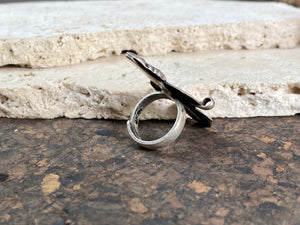 Stunning tribal ring from regional Rajasthan, India. High grade or sterling silver. Adjustable back so it will fit a number of different finger sizes. Measurements: Ring face: 4.5 x 2.6 cm Size: Anywhere from size 6 to size 8, this ring is adjustable