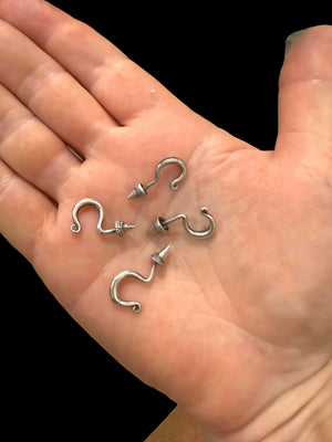 Old hill tribe silver cone or hook earrings, from the Hmong people of the Golden Triangle. Early 20th C. Silver. Measurements: Height approximately 2.5 cm