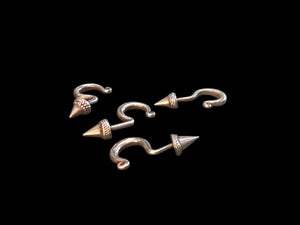 Old hill tribe silver cone or hook earrings, from the Hmong people of the Golden Triangle. Early 20th C. Silver. Measurements: Height approximately 2.5 cm