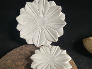 Hand crafted shallow bowls or plates, hand carved in Rajasthan from the finest local white marble in the form of an open lotus flower. Select from two sizes. Small 16 cm diameter, Large 26 cm diameter