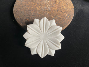 Hand crafted shallow bowls or plates, hand carved in Rajasthan from the finest local white marble in the form of an open lotus flower. Select from two sizes. Small 16 cm diameter, Large 26 cm diameter