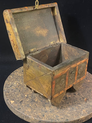 Vintage Indian jewellery box on wheels. Originally designed to be a children's toy, small jewelry box or trinket box. Rosewood, covered in embossed brass with copper strap highlights. A lovely old jewellery chest. Circa 1920. Handmade in India. Measurements: length 18 cm x depth 13 cm, height 13 cm.