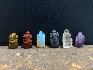 Hand carved from luminous gemstone, these are the perfect small Ganesh statue for travelling, if you're short on space or like to keep Ganesh with you at all times. Select the one you like best from the drop down menu. Range in size from 2.5 - 3 cm