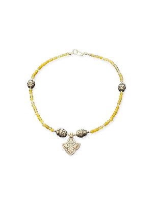 Short choker necklace of yellow jade, handmade Indian vintage silver art deco 'pineapple" beads and a centre silver pendant. 39 cm length