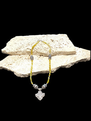 Short choker necklace of yellow jade, handmade Indian vintage silver art deco 'pineapple" beads and a centre silver pendant. 39 cm length