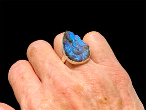 Hand carved labradorite ring with excellent fire featuring Ganesh. Sterling silver. A high quality stone with excellent colour. Stone 3 cm. Size 6.5