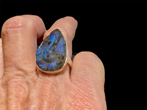 Hand carved labradorite ring with excellent fire featuring Ganesh. Sterling silver. A high quality stone with excellent colour. Stone 3 cm. Size 6.5