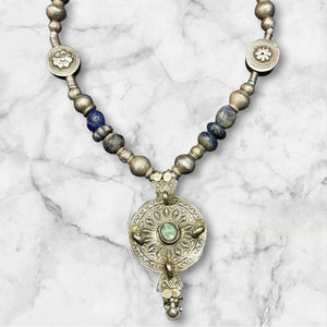 Unique statement necklace crafted from antique Afghani lapis, Indian tribal beads, old silver Uzbeki beads & an antique Tibetan centrepiece. Length 46.3 cm