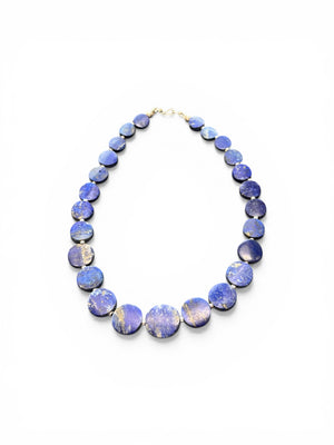 Natural lapis lazuli flat disk beads, colour matched and graduated, with sterling silver spacer beads and a sterling silver clasp. Length 43 cm