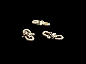 Sterling silver jewellery S clasps.Measurements: length 1.6 cm. Width 1 cm