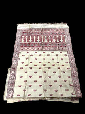 Hand loomed muga silk saree in two pieces. Guwahati region, Assam, northeast India. 100% muga silk in both warp and weft. Length 5.5 m x 109 cm