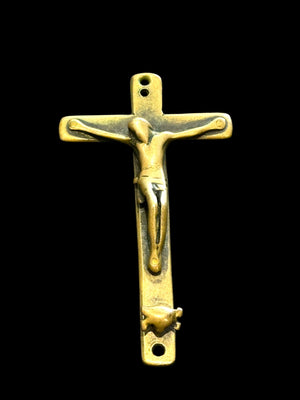 Late 19th C Italian crucifix. Brass, rubbed. Naples, Italy. Christ on cross with skull and crossbones below, representing Adam’s skull. H 6.6 cm, W 3.7 cm