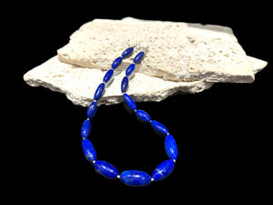 Simple and elegant, our short necklace is made from deep blue Afghan lapis lazuli and sterling silver, with a sterling silver clasp. Length 41.5 cm.
