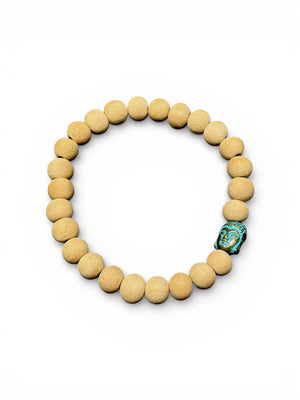 Women or men’s yoga bracelet. Made from real sandalwood and features a detailed brass Buddha head bead. On sturdy elastic cord.
Sandalwood beads 6 mm diameter, Buddha bead is 1 cm in length