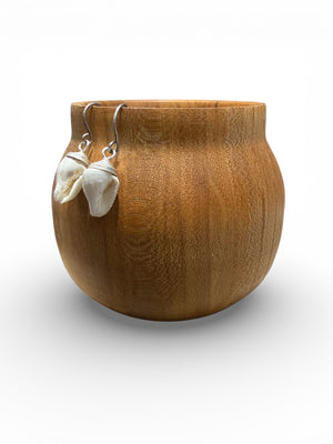 Simple and petite natural shell earrings finished with sterling silver mounts and hooks. Length including hook 2.7 cm