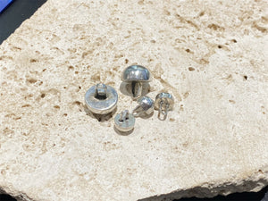 Sterling silver buttons. Large loops/bails. Sturdy construction, will not dent.  Diameter large 1.5 cm, small 0.8 cm