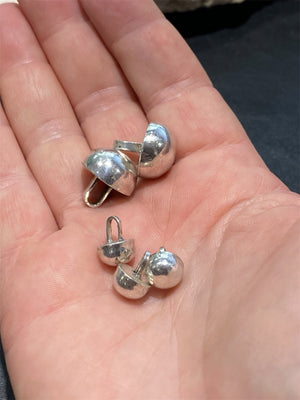 Sterling silver buttons. Large loops/bails. Sturdy construction, will not dent.  Diameter large 1.5 cm, small 0.8 cm