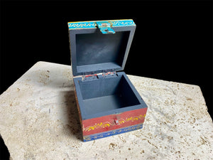 This intricately painted box features a spacious compartment perfect for holding trinkets, jewellery or keys. A lovely, hand painted piece of craftsmanship from Rajasthan, India and our absolute best selling small box.
Measurements: width 9.5, depth 9.5cm, height 8 cm