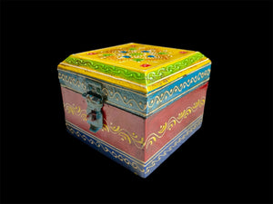 This intricately painted box features a spacious compartment perfect for holding trinkets, jewellery or keys. A lovely, hand painted piece of craftsmanship from Rajasthan, India and our absolute best selling small box.
Measurements: width 9.5, depth 9.5cm, height 8 cm