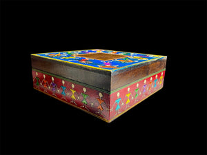 This charmingly painted box features one single, square compartment and features a lid that lifts off completely. The roominess of the box means it is perfect for holding everything from trinkets to jewellery and keys. A lovely, hand painted piece of craftsmanship from Rajasthan, India.
Every box is hand painted differently so expect variation I colour and pattern when ordering.
Measurements: width 20, depth 20 cm, height 7.5 cm